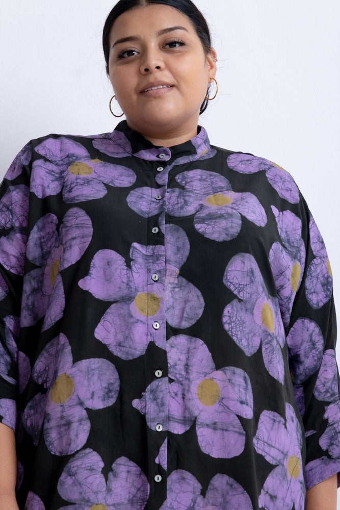 Floral Para Dress with button-up front, large purple flowers, yellow centers, and batwing sleeves.