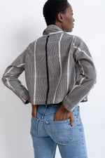 Back view of the Abiba Jacket, a loose-fitting & blazer-esque with one inside pocket & a slim rolled lapel.