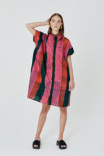 Colorful Bata Dress in Carmine batik print, with mandarin collar and button front, exuding bold elegance.