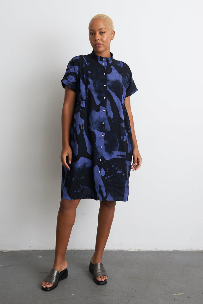 Loose-fit Bata Dress with abstract Rorschach print, mandarin collar, and mother-of-pearl buttons.