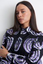 Bold Bula Shirt with striking swirl print design, perfect for a statement look with a relaxed vibe.