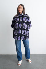 Unisex Bula Shirt with Good Signal print, casual and comfy for any setting, with white sandals.