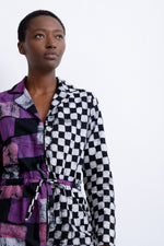 Stylish Accra Jumpsuit with Adepa print, black and white checkered and purple abstract design, cotton fabric with waist tie.