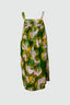 Front view of the Saya Dress in Waters, an abstract print of pink organic forms and yellow squiggles on dark green.