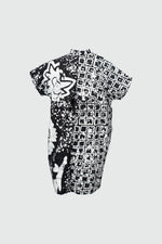 Front view of oversized cotton dress in small size with a black and white abstract flower and grid batik pattern.