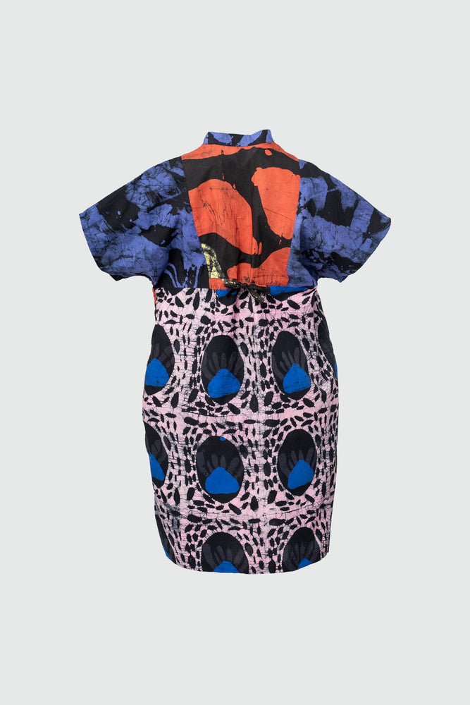 Flat back view of a dress with colorful and intricate patterns, a great choice for a trendy outfit.