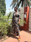 Long wrap dress with batwing sleeves, deep V neckline, side slits, wider waist tie. Hand dyed Cantaloop print.