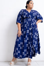 Letsa Dress in Middle Path print, blue with white geometric patterns, short sleeves, against a white background.