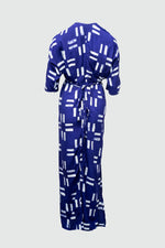 Mannequin in Letsa Dress with Middle Path print, deep blue with white print, tied waist, against grey background.