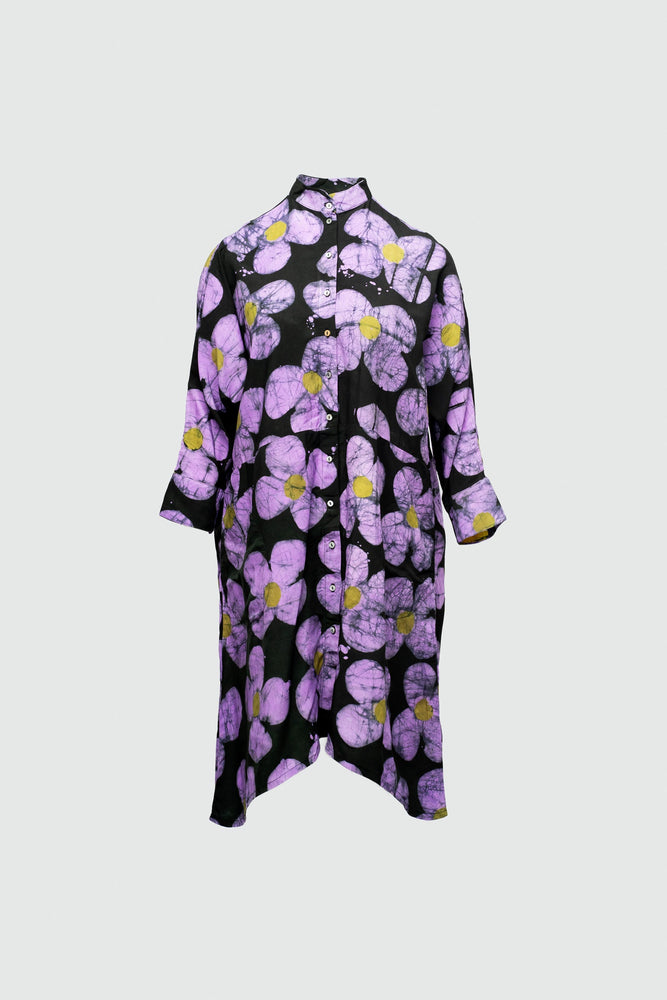 Black floral shirt dress with large purple and yellow flowers, button-up front, and neat collar.