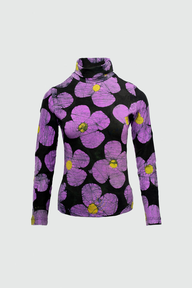 The Stricta Turtleneck in Love Perfect, a vibrant purple floral print against a dark background, bold and unique design.