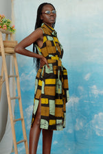 Tropicana Dress in Pistacia: Close-up of the button-front detail and self fabric belt.